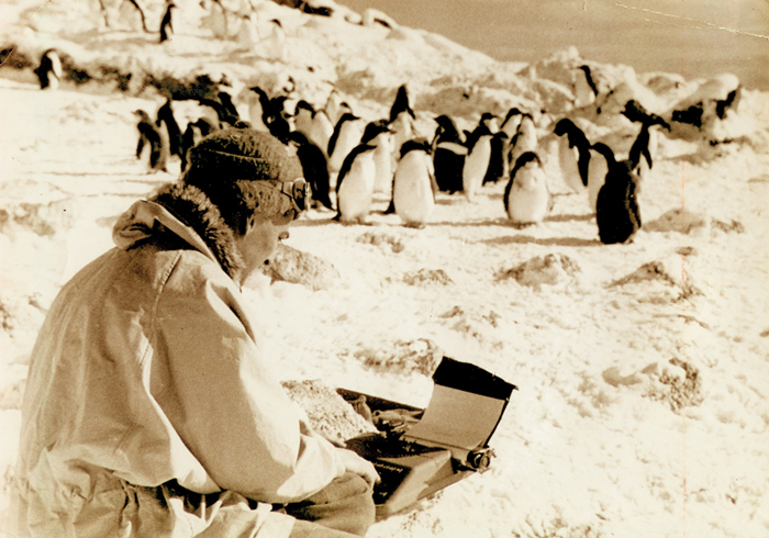 Geoffrey Lee Martin typing a story in Antarctica.