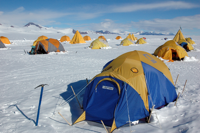 Tents pitched on snow.