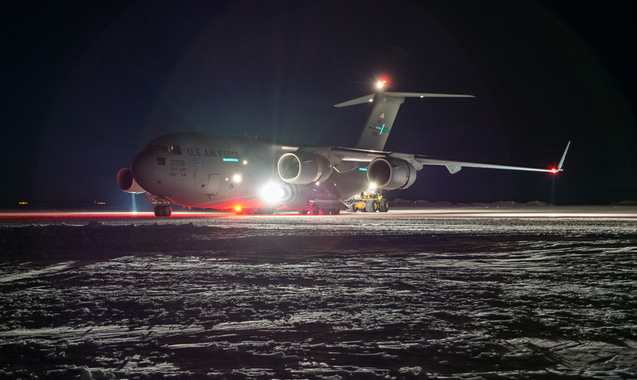 An Air Force C-17 at Pegasus Airfield in the darkness of an Antarctic June