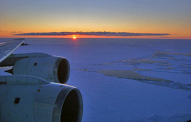Wing of plane and ice horizon.