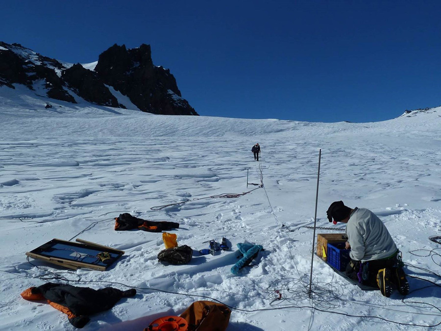 Researchers set up their equipment on Mount Erebus to probe the interior of the volcano