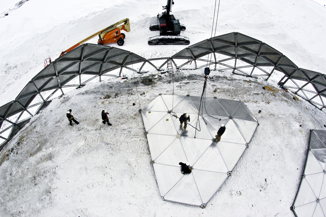A crew disassembles the South Pole Dome.