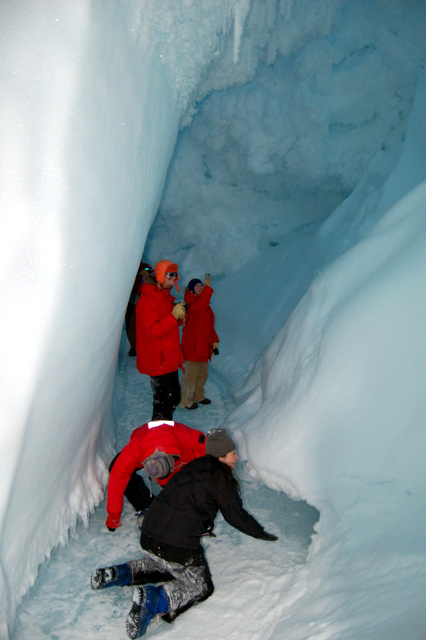 McMurdo residents explore an ice cave.