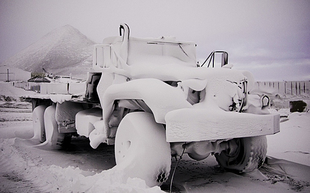 Truck covered in snow at McMurdo Station.
