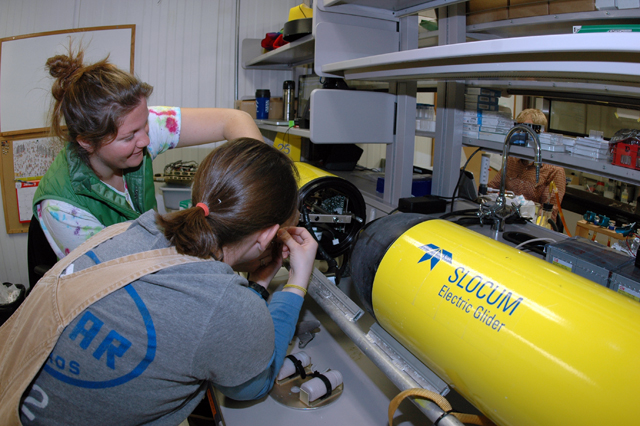 Scientists work on underwater glider.