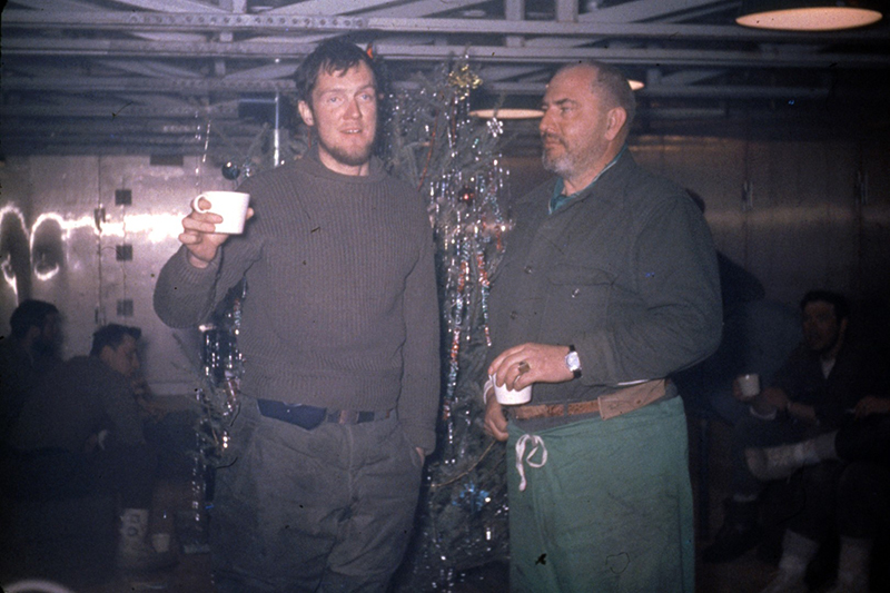 Dick Bowers (left) and South Pole chief scientist Paul Siple celebrate the first Christmas at the South Pole in December 1956. It was the one day of respite while otherwise working non-stop to build the first South Pole station.