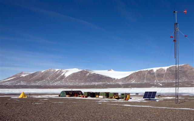 Fryxell Field Camp with wind and solar array.