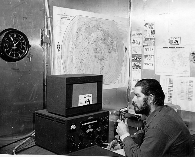 Man operates ham radio in 1956.