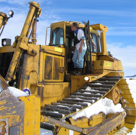 Woman on heavy machine.