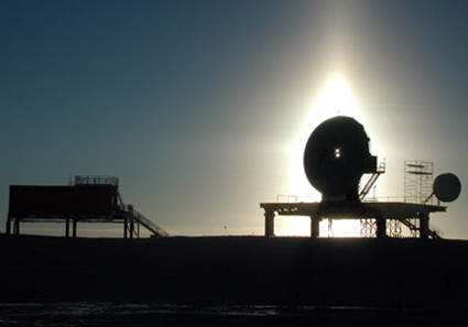 A silhouette of the South Pole Marisat-GOES Terminal.