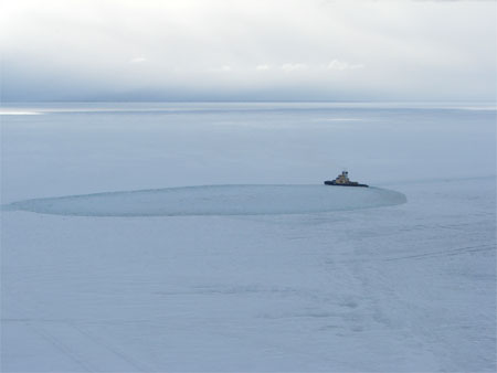 Vessel clears away ice.