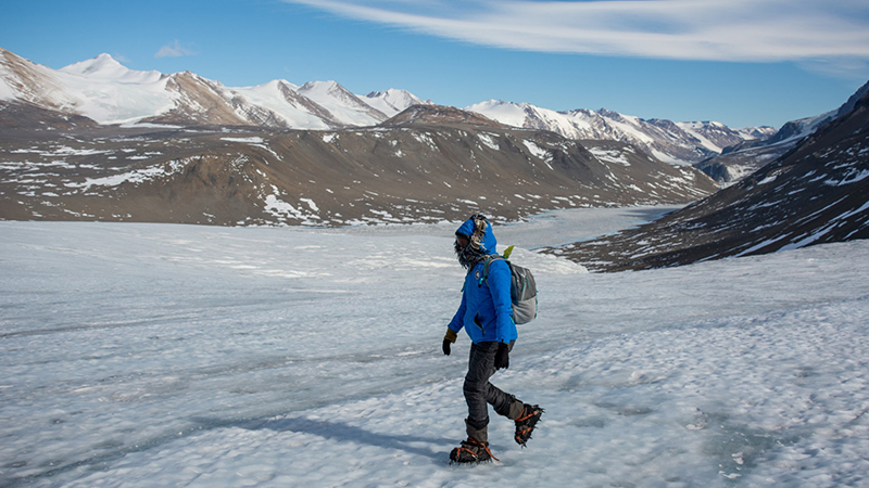 Scarano treks across the Canada Glacier, adjacent to the Lake Hoare field camp.
