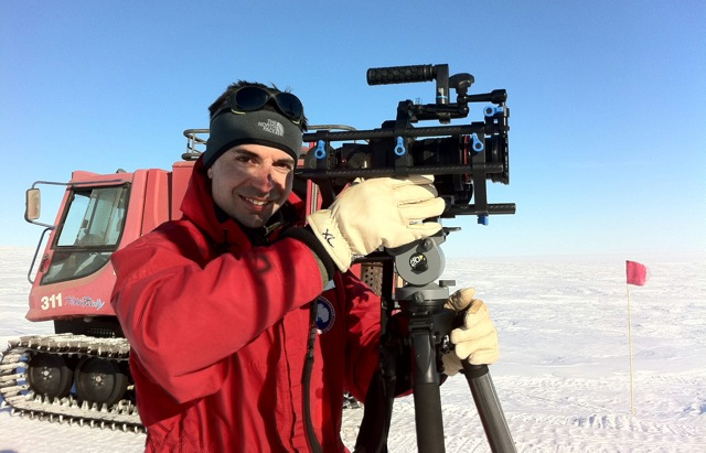 Man with camera in cold place.