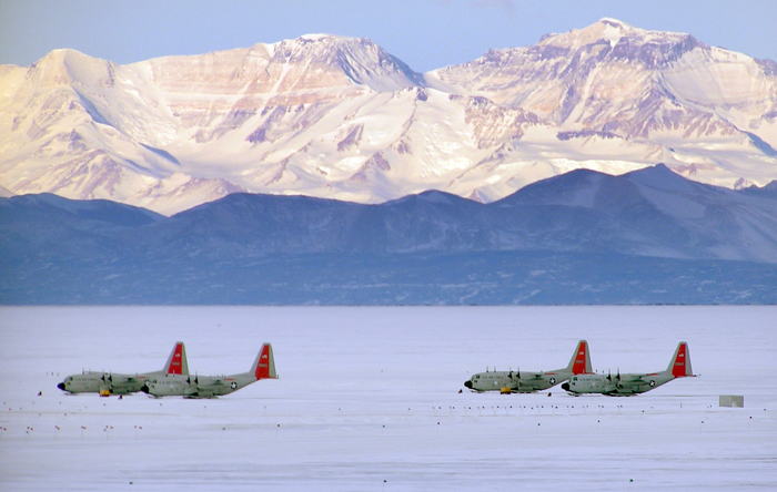 NYANG LC-130s sit on the sea ice runway.
