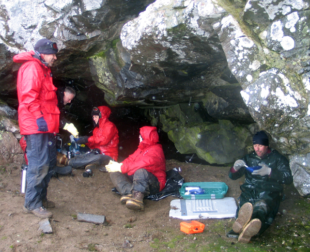 Livingston Island party takes shelter in cave.