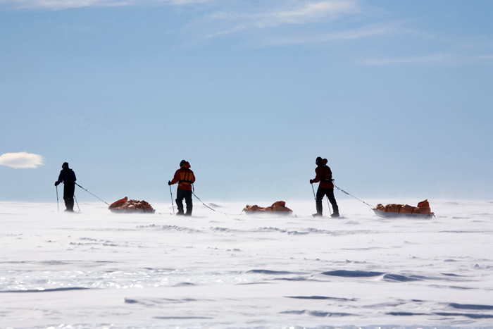 Tourists ski the last degree to South Pole.