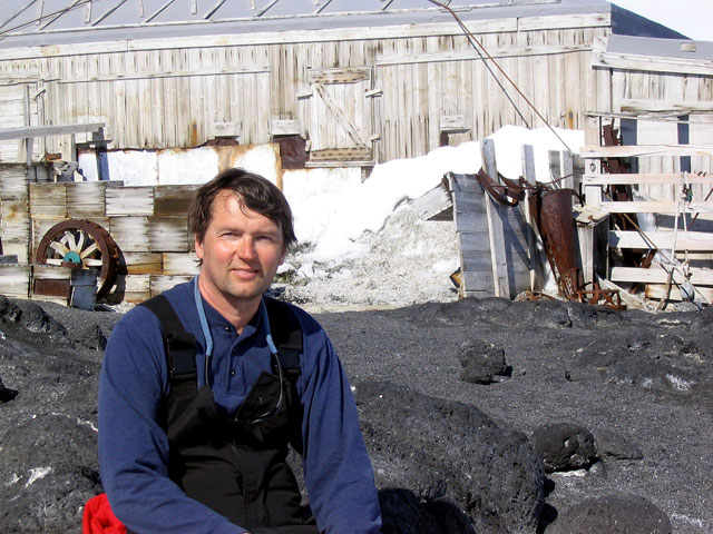 Ed Larson in front of Shackleton hut.