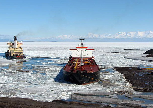 Two ships in ice-choked sea.