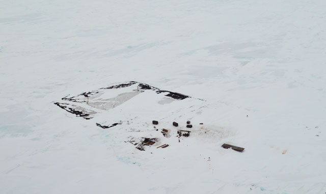 Aerial view of items on ice.