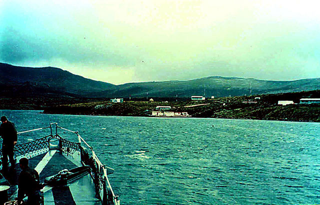 Bow of ship heads toward land.