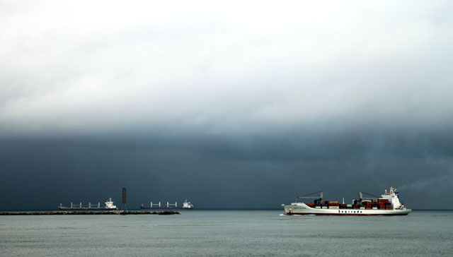 A container ship enters Limon Bay.