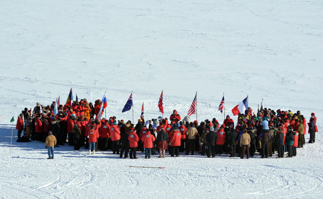 Crowd of people in a cold place.