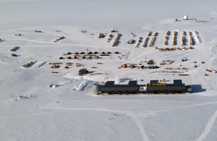 Large buildings and many smaller ones on ice.