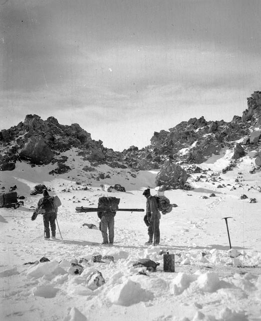 Black of white image of people in cold weather gear.