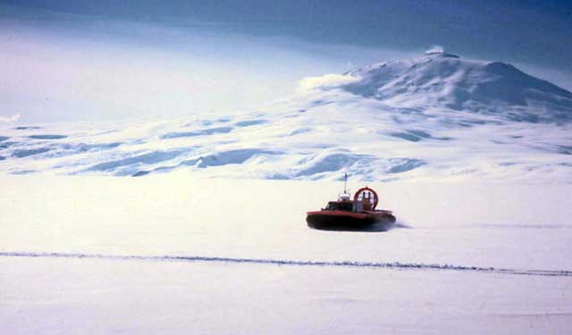 A hovercraft glides across ice.