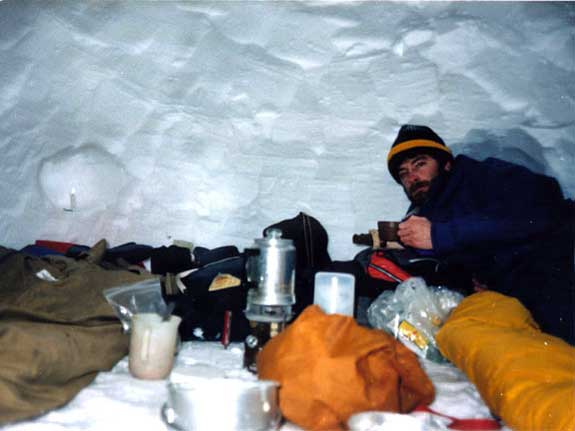 Person inside snow cave.