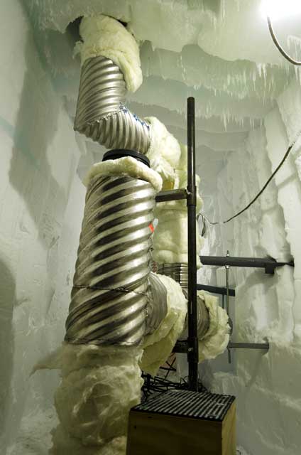 Large pipes run through ice.