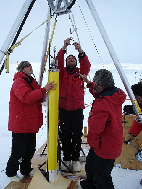 Scientists prepare to deploy an instrument.