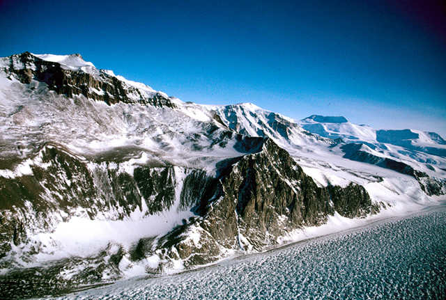 Snow-covered mountains and river of ice.