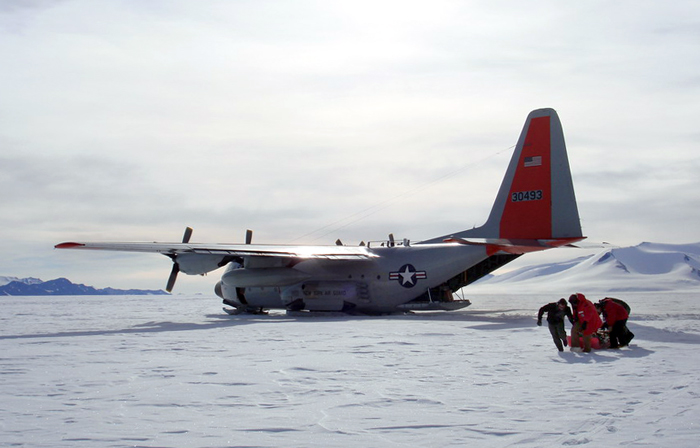 LC-130 delivers science team to field camp.