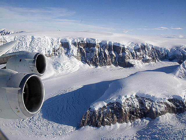 Valley full of snow with airplane engine.