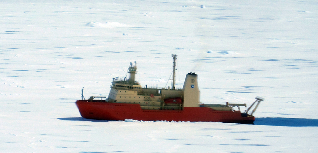 Ship moves through sea ice.