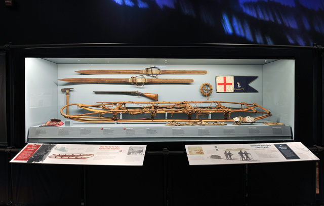 Display case holds skis and sled.