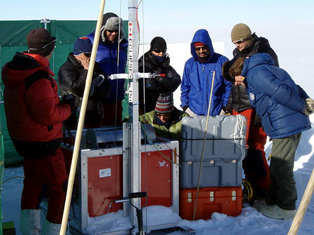 Traverse team attempts to recover stuck drill.