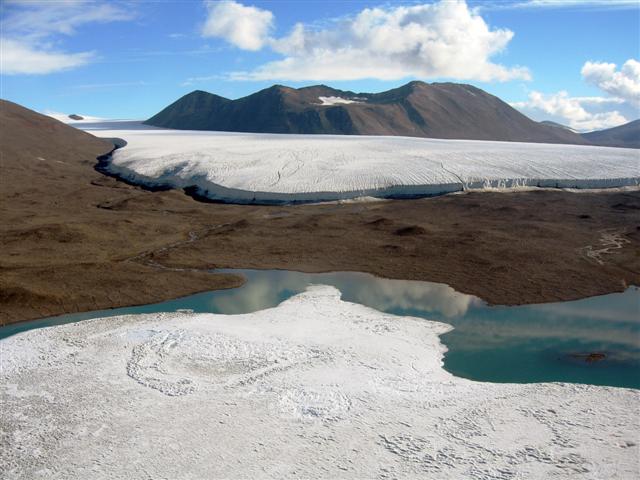 Ice covered body of water and glacier.