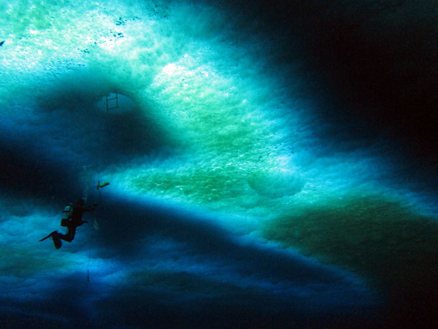 Diver approaches dive hole.