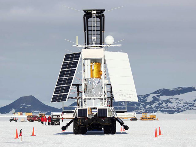 Spacecraft-looking instrument stands on ice.