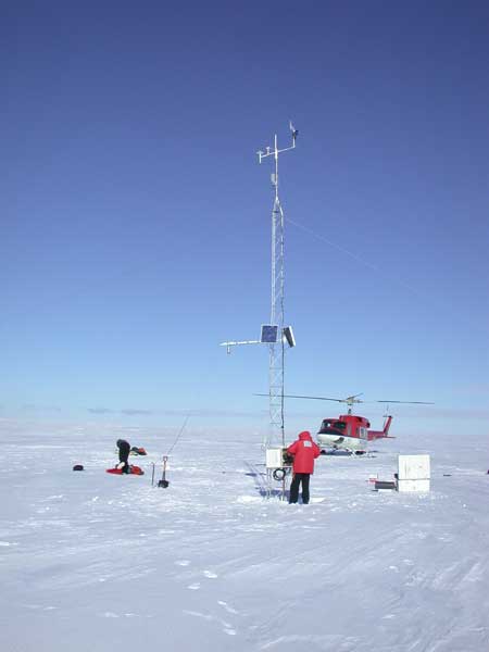 People set up tower on slab of ice.