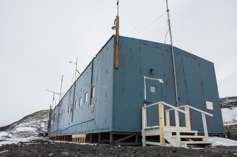 The CosRay building sits atop the pass between McMurdo Station and New Zealands Scott Base.
