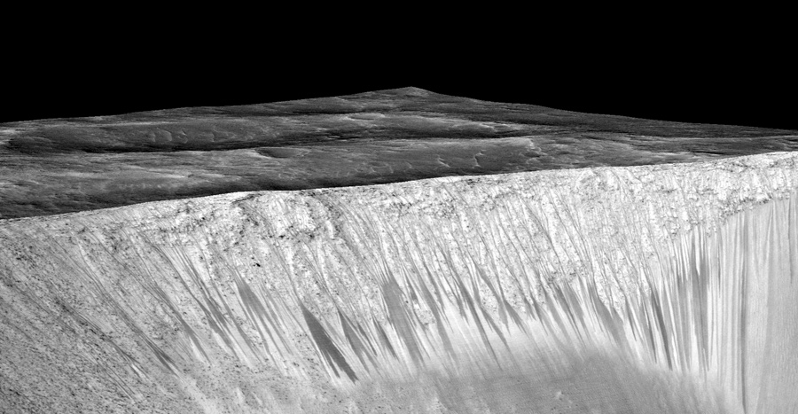 A 3D projection of satellite data showing the dark briny streaks of water flowing on Mars