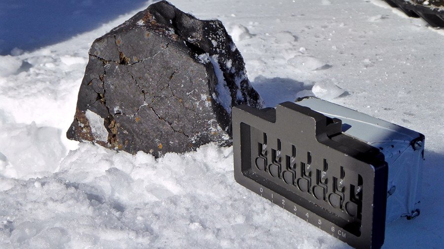 Their dark fusion crust makes meteorites easy to see against the white and blue ice