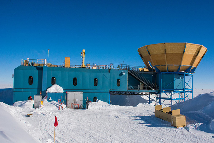 A little ways away from the South Pole station, the Keck Array is shielded from interference reflected up from the ground behind a protective shroud.