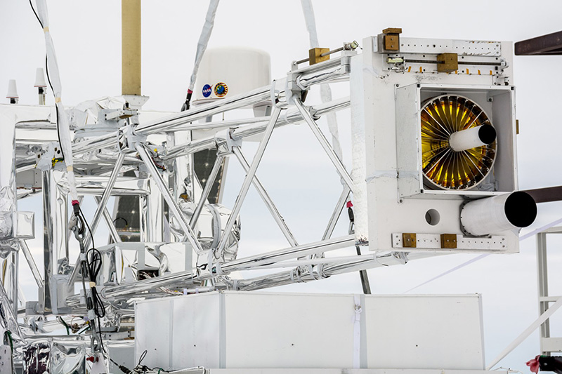 A series of concentric mirrors at the end of the telescope's 8-meter boom focus the incoming x-rays onto X-Calibur's detector.