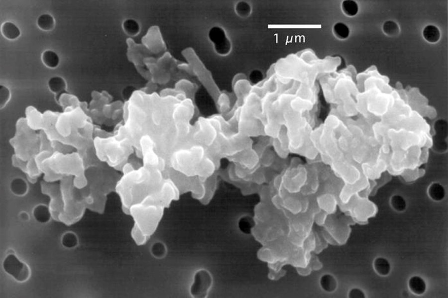 Cosmic dust particles, like this one seen under an electron microscope, can be leftovers from before our solar system coalesced into planets, or particles from distant star systems