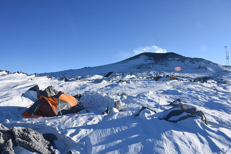 The team camped on the side of Mount Erebus, who’s smoking crater can be seen in the background