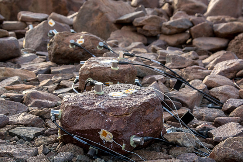 The team is hoping that the four rocks wired up with acoustic emission sensors will collect data throughout the austral winter.